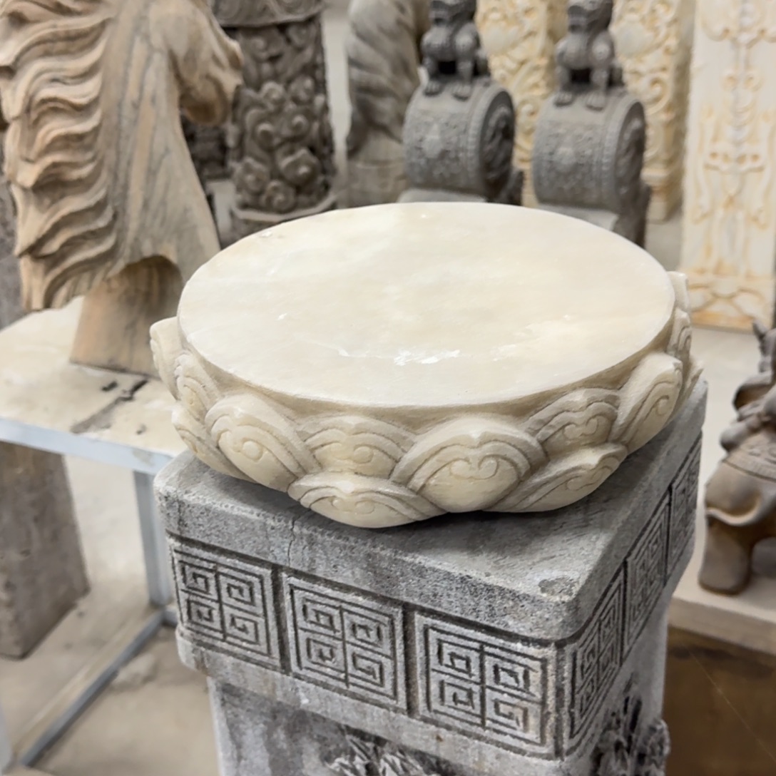 茶***子石材官方认证老石雕不包邮一对