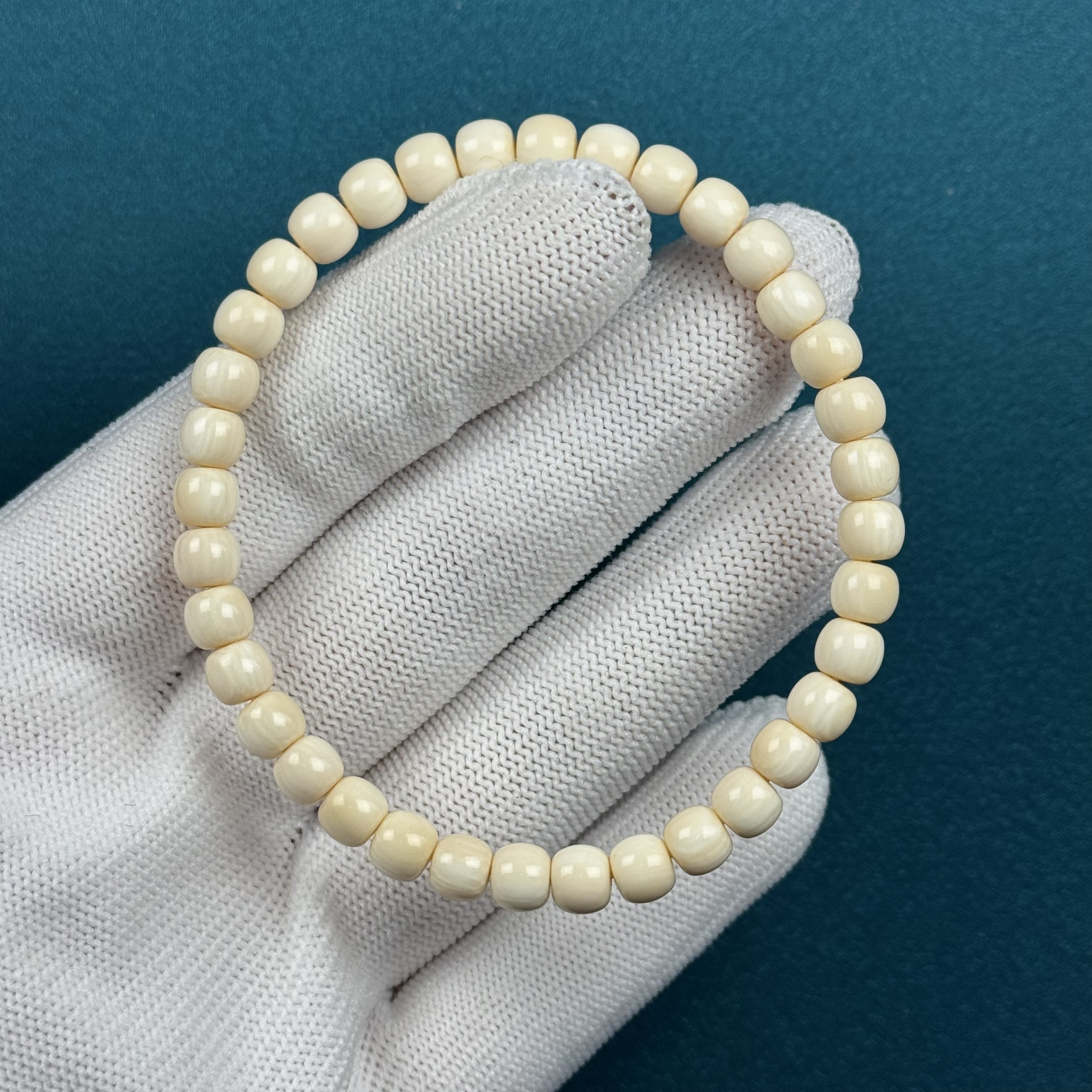 Q45-33天然猛犸牙 老型手串5.8*4.8mm支持复检假一罚十