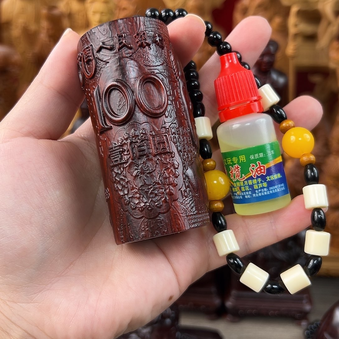 木1人紫檀木圆形手把件