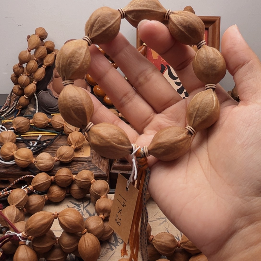 Y***C橄榄核手串19.28梅林铁核