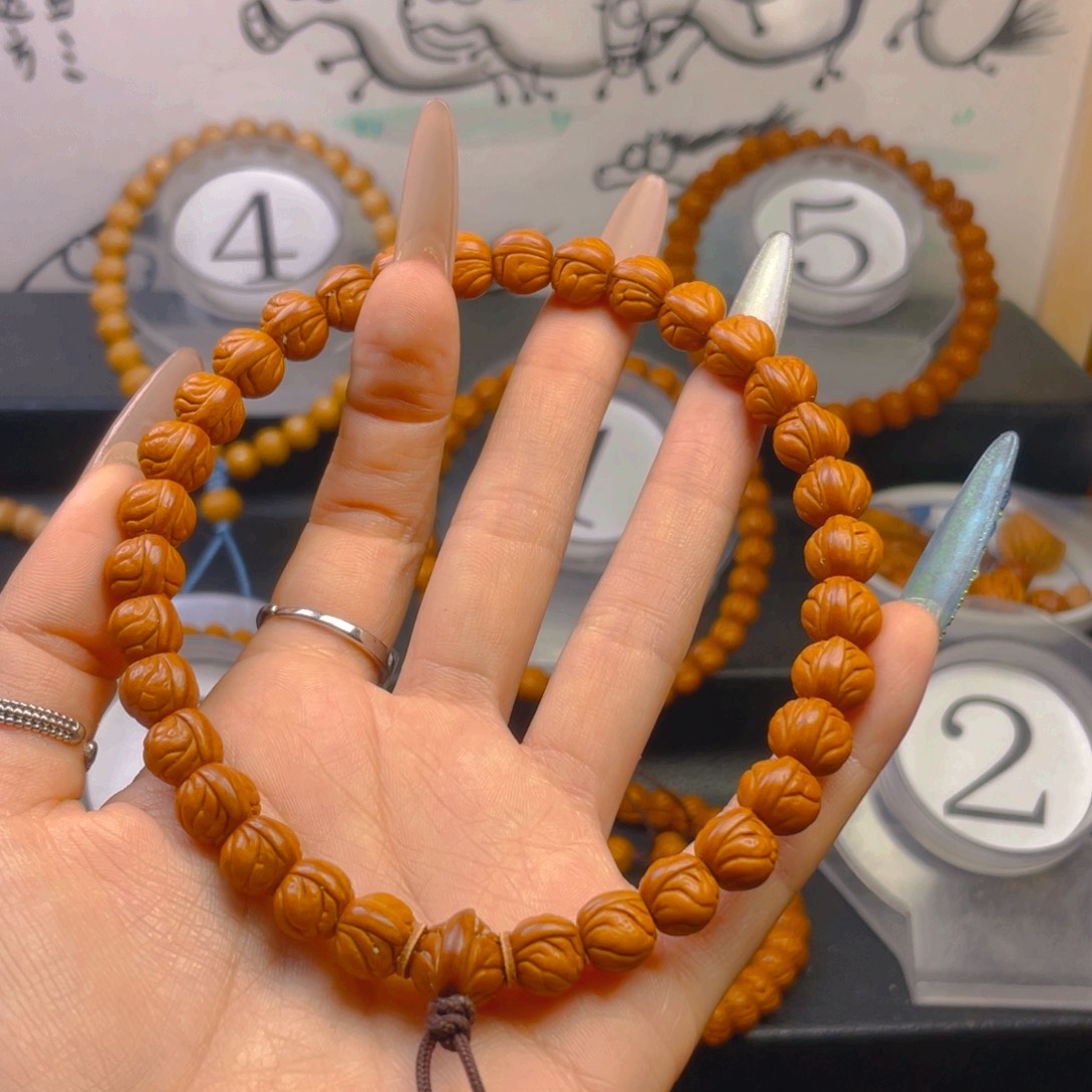 杨***呆桃核吊坠0.999999955555555