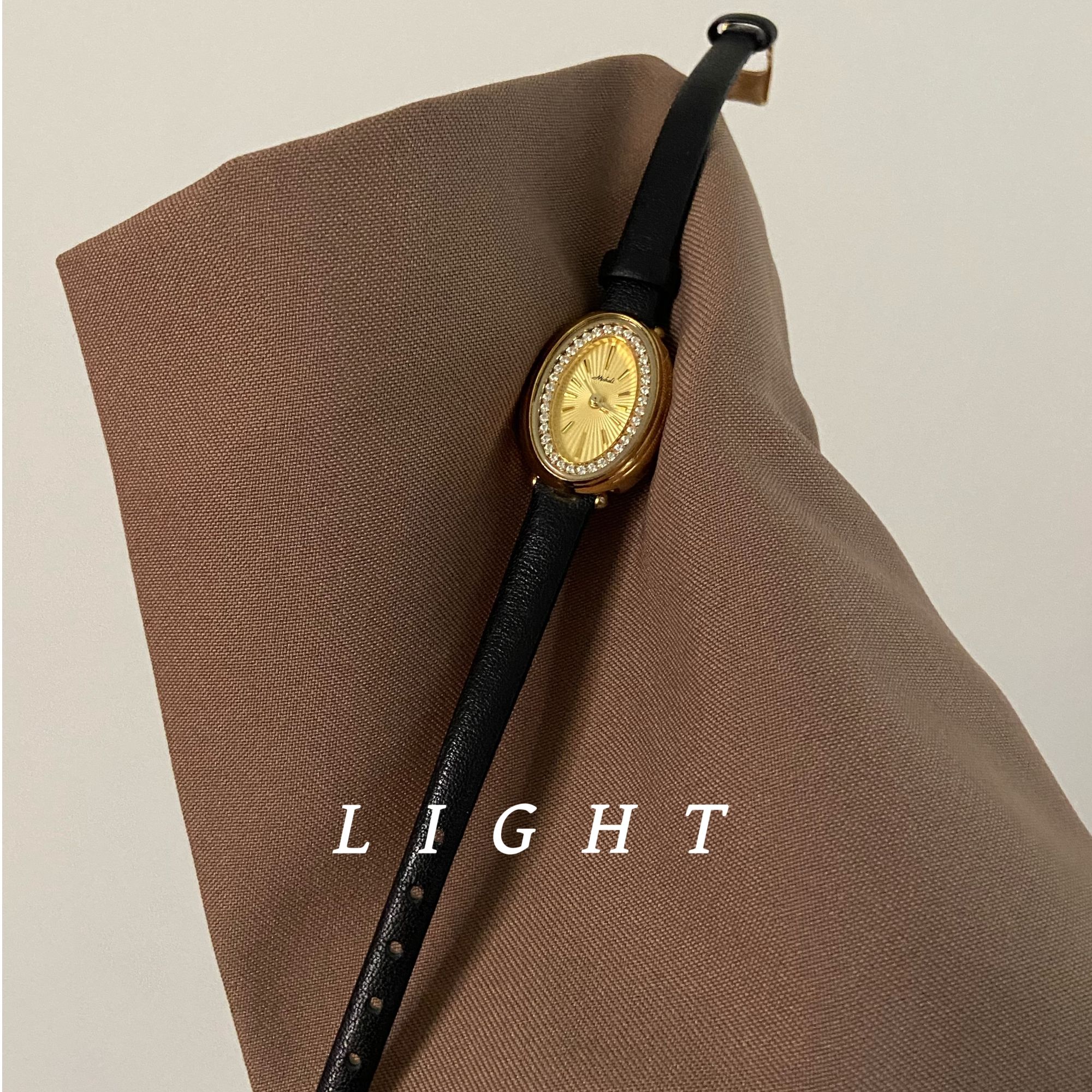 LIGHT 椭圆形黑金精致感真皮轻奢感高级石英女表