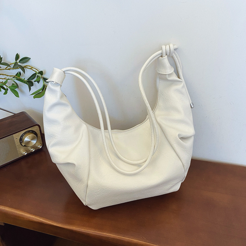 pu通勤单肩女包美拉德风复古软面饺子包春季新款时尚褶皱腋下包