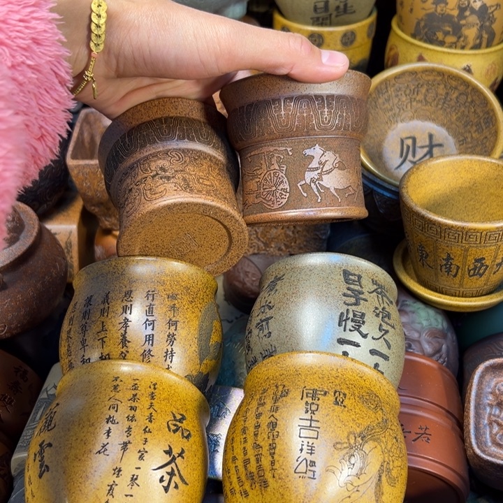 紫砂茶杯宜兴紫杯子