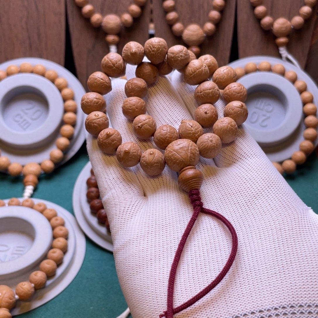 爱***蕾手串凤眼菩提11.7mm到12mm精品粉红皮手持