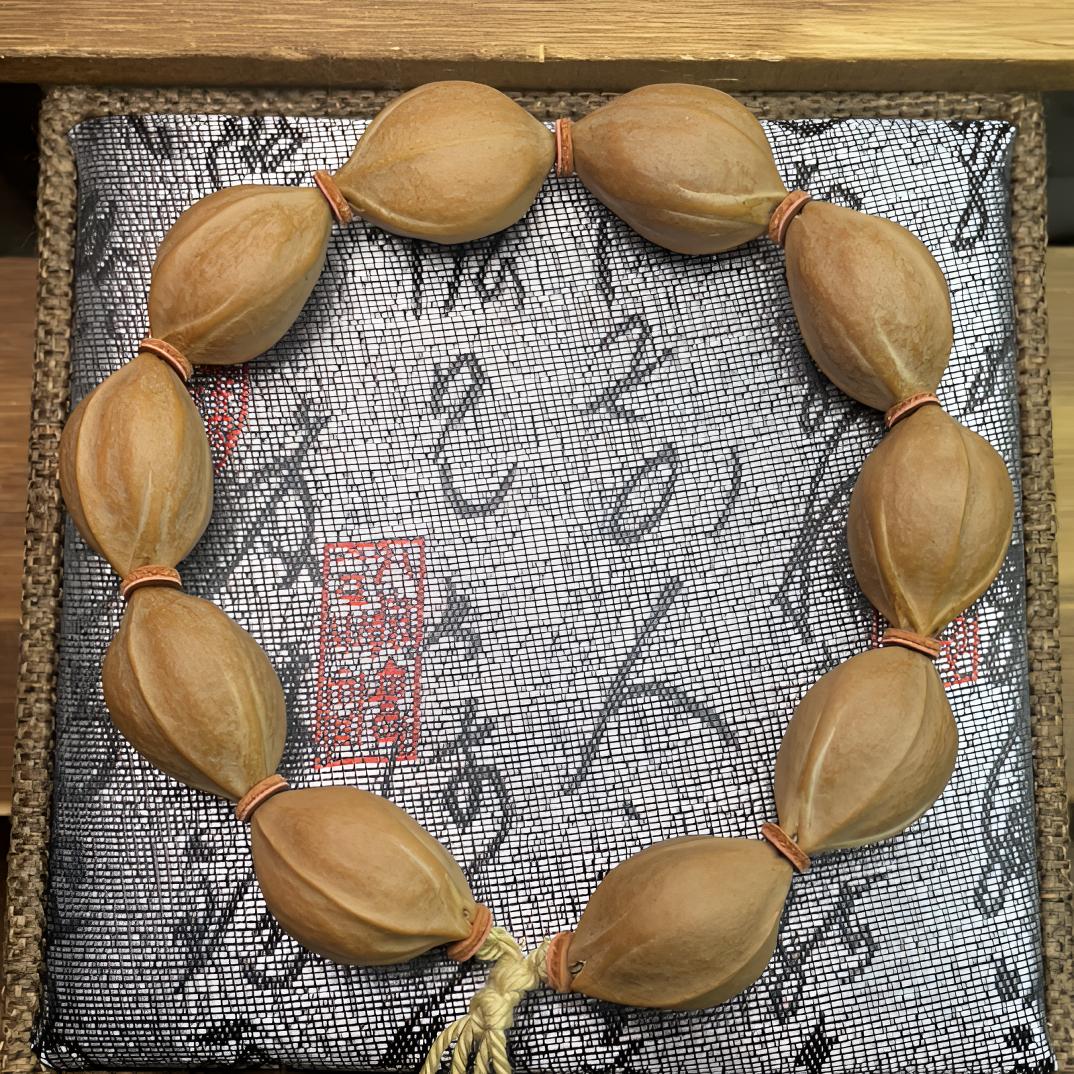 1726精品梅林铁蒜头 橄榄核素串