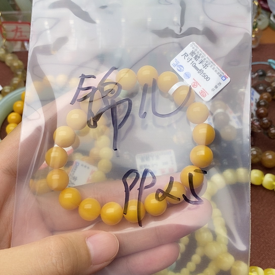 和田玉手镯未镶嵌锦****糖