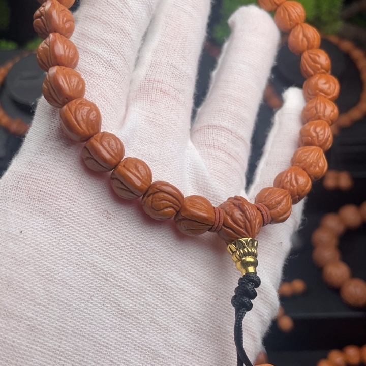 转***角吊坠桃核精品手持