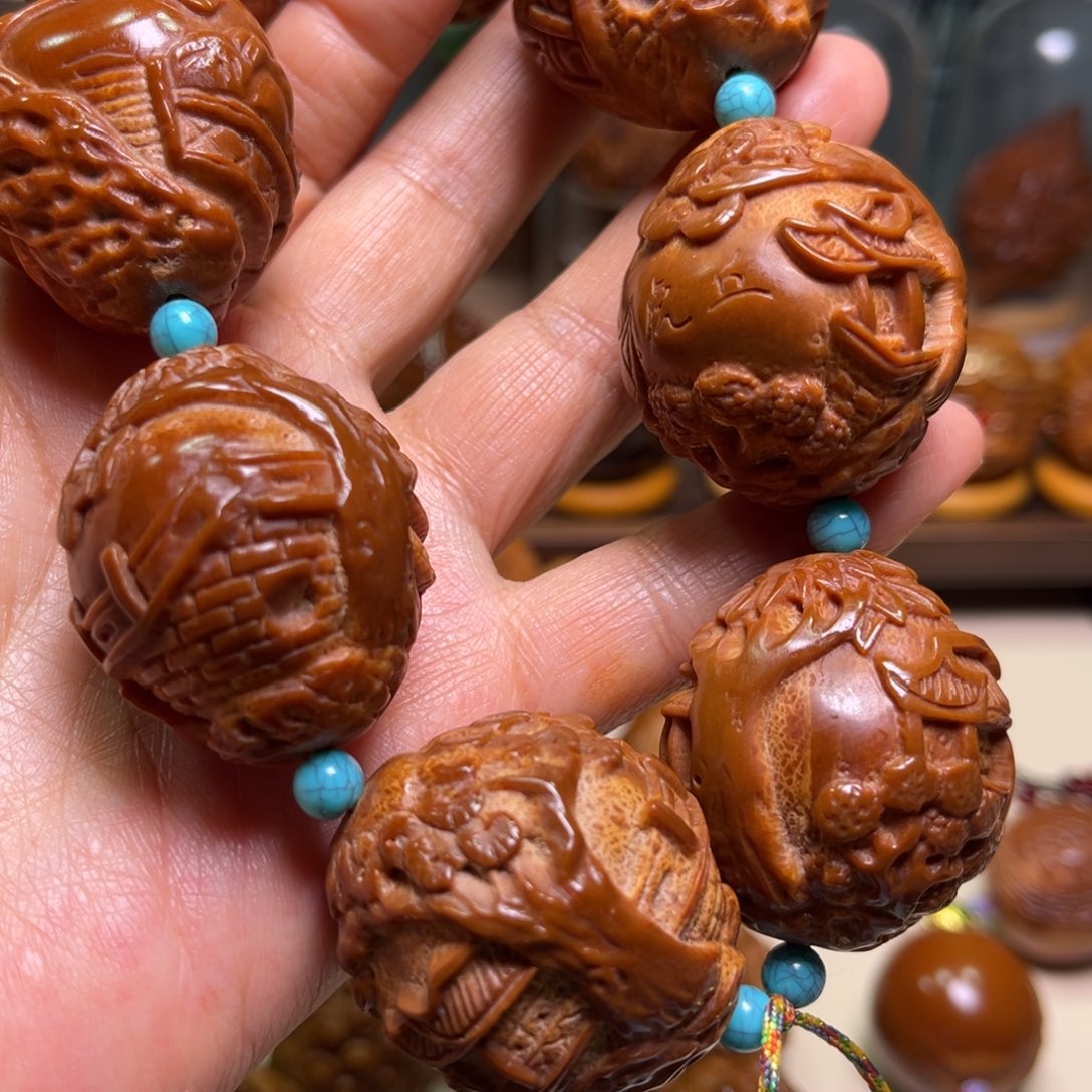 橄榄核把件哆**梦园林手持