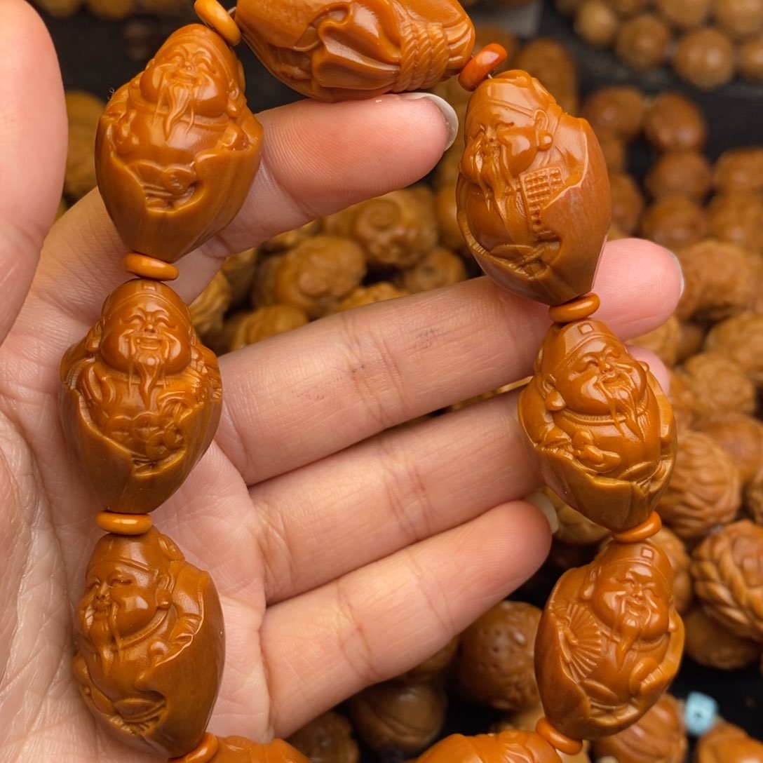 橄榄核吊坠包衣财神1.7