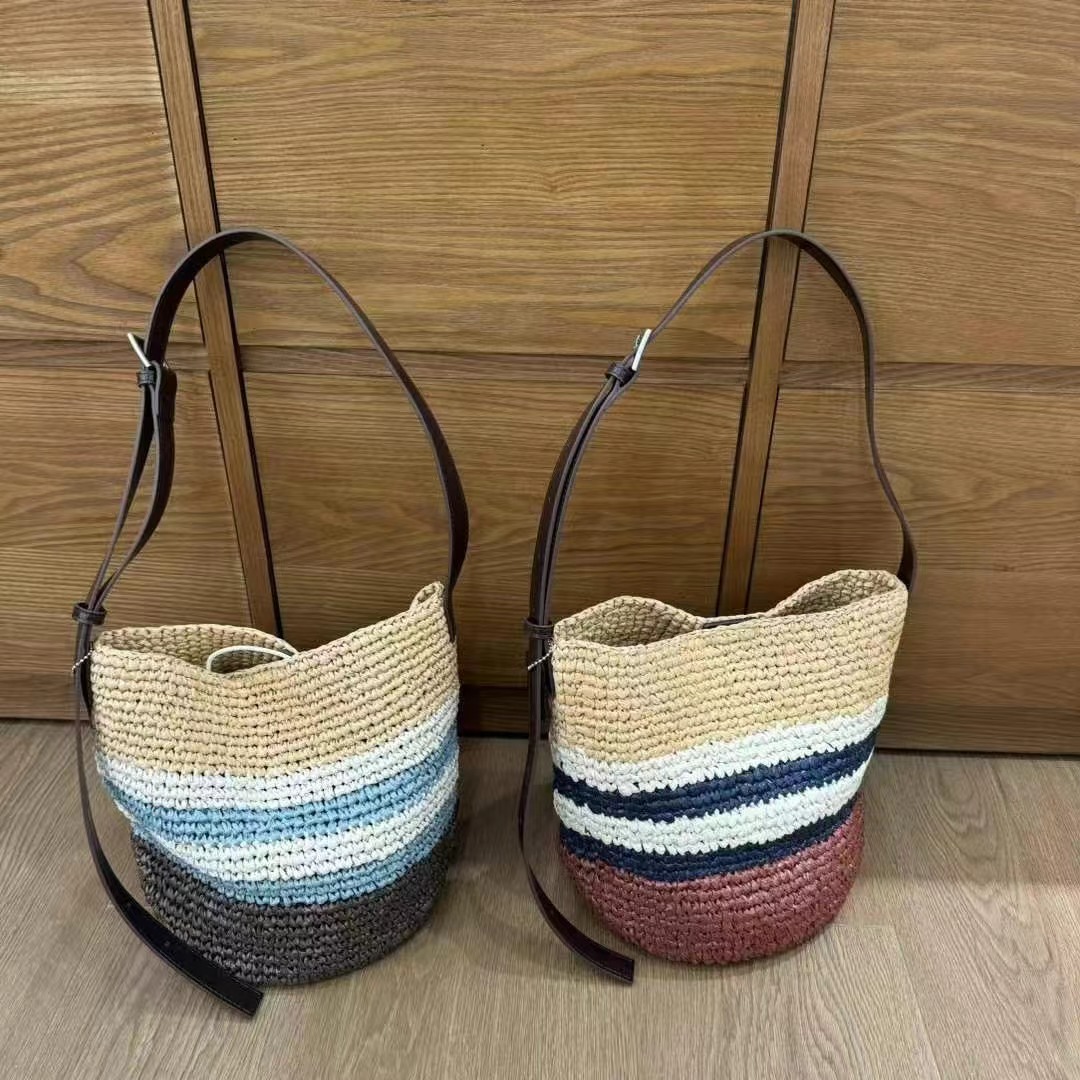 【薇薇绮】夏季新款海边度假风拉菲草编织撞色条纹水桶包 D835