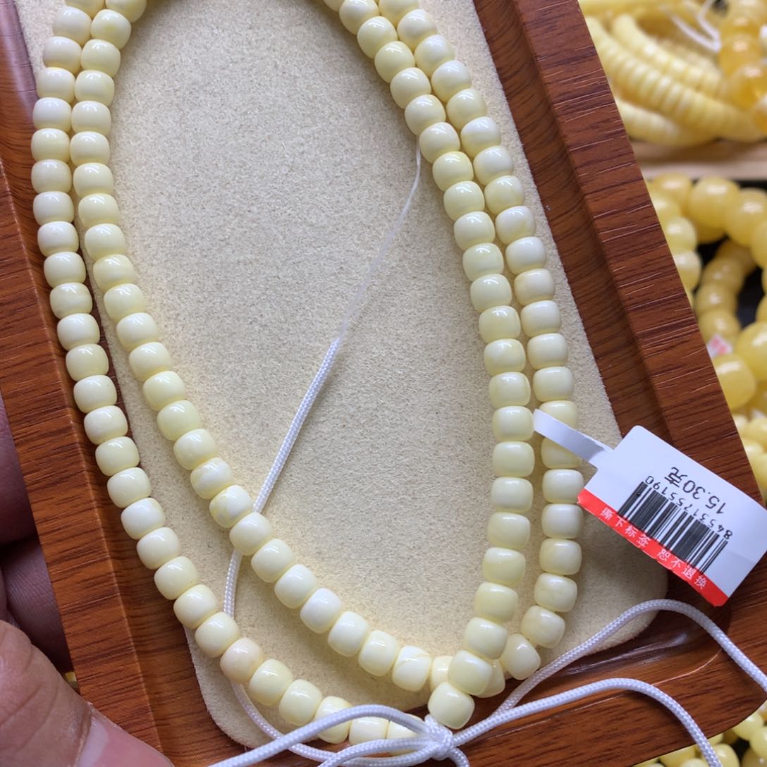 蜜蜡手链未镶嵌为**争蜜蜡