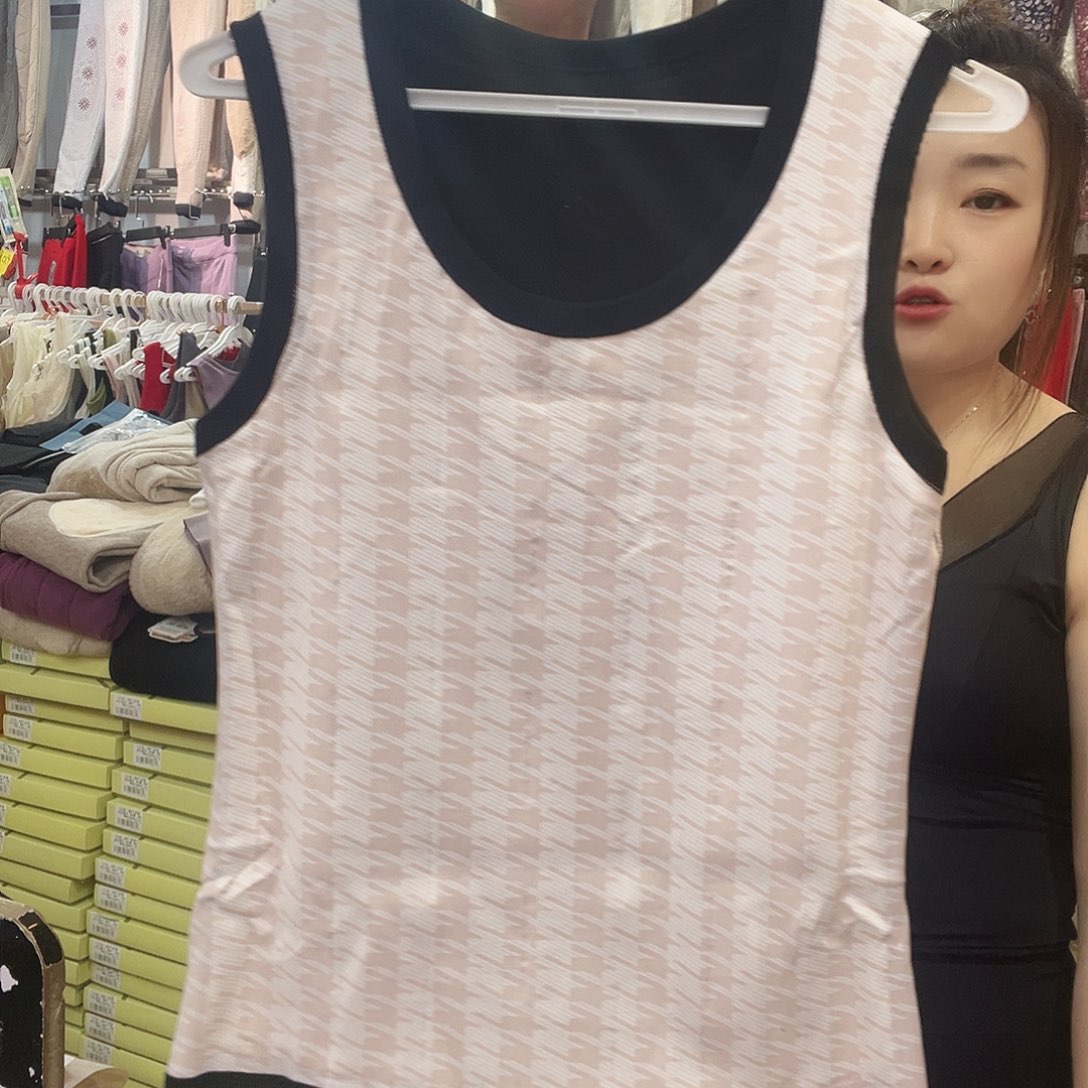 羊羔毛90-125斤女款黑色羊毛背心