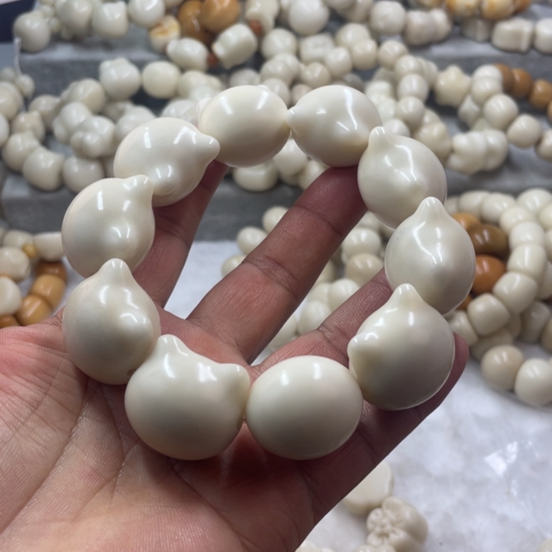 吊坠菩提根/象牙果全品象牙果猫头手串k27
