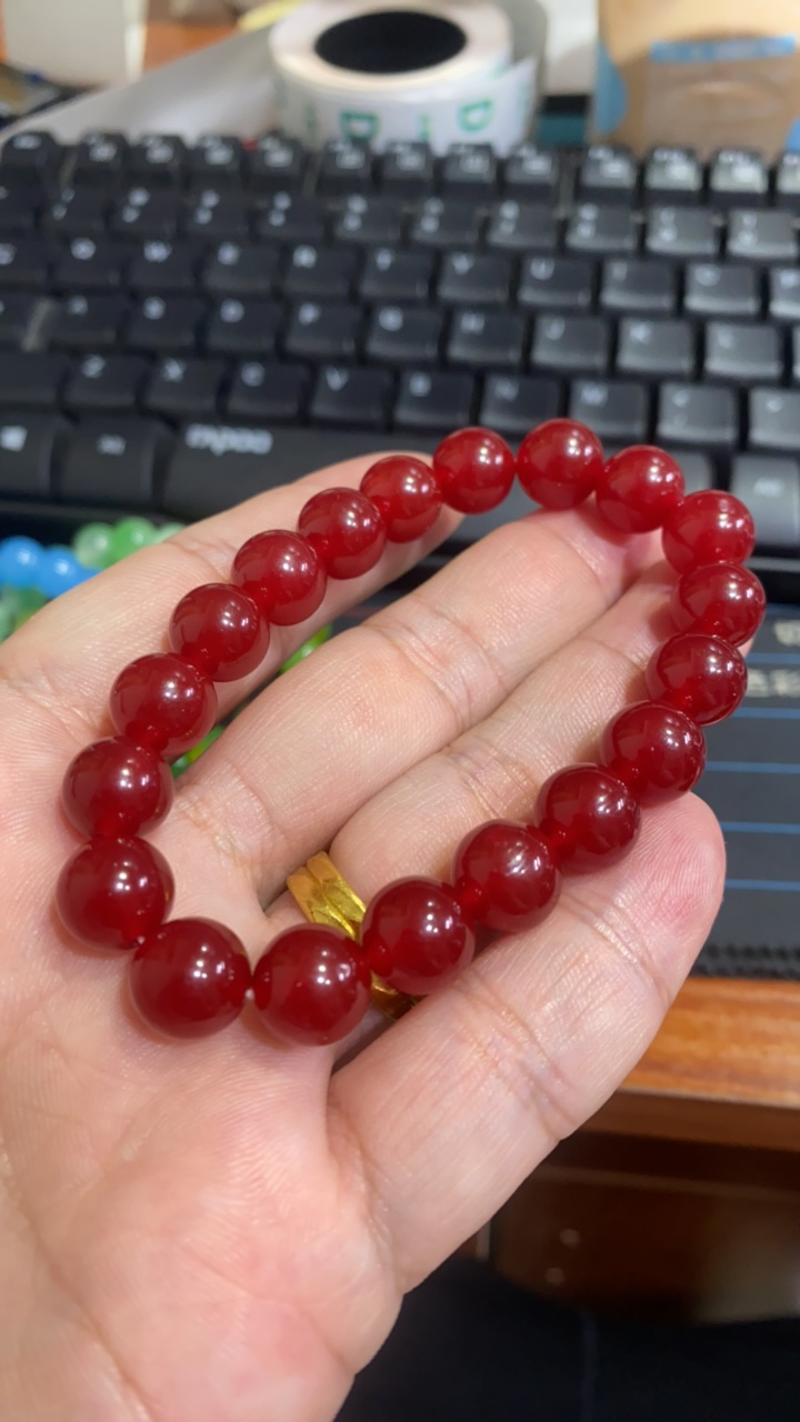 D 711  10 鸡冠红手串