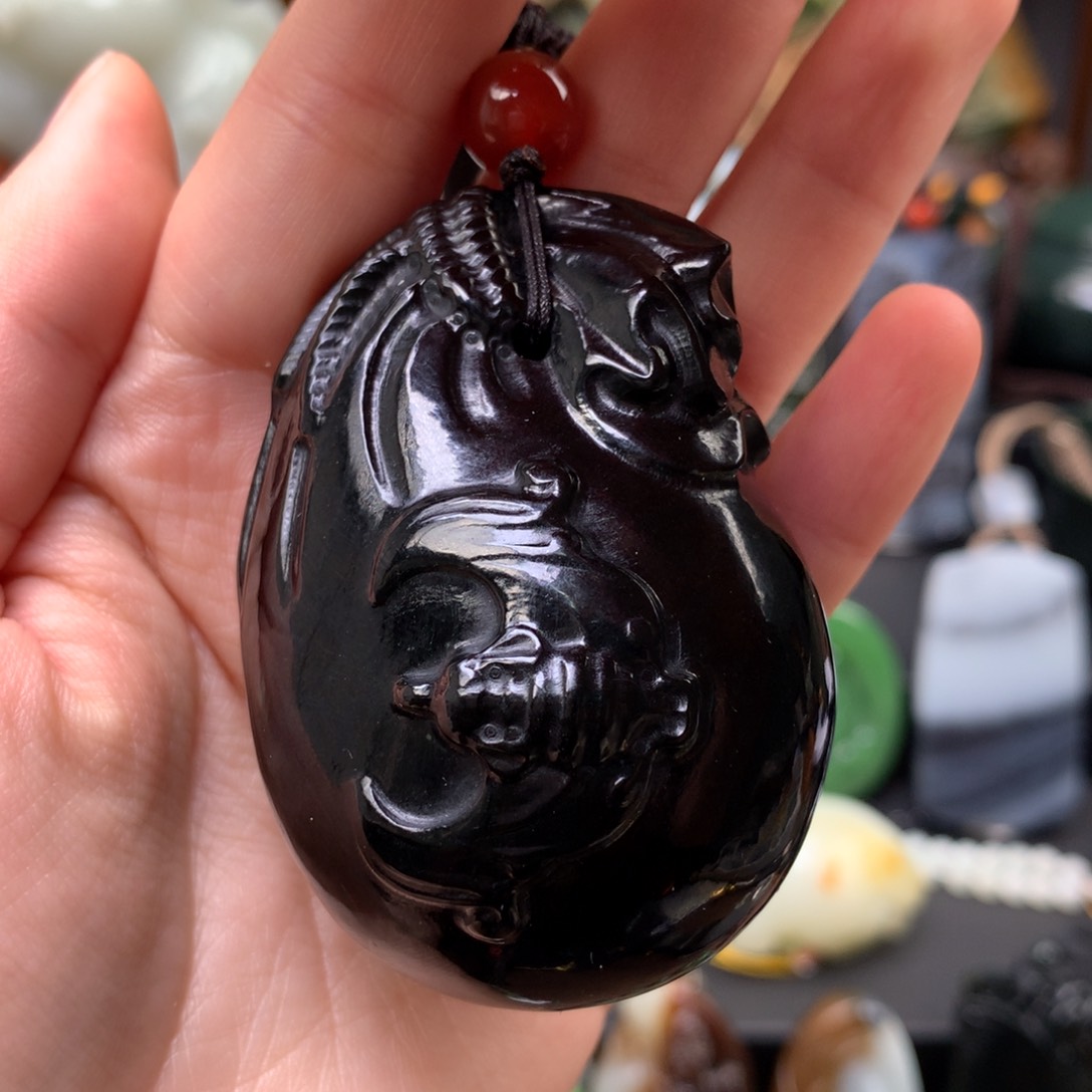 和田玉手把件未镶嵌