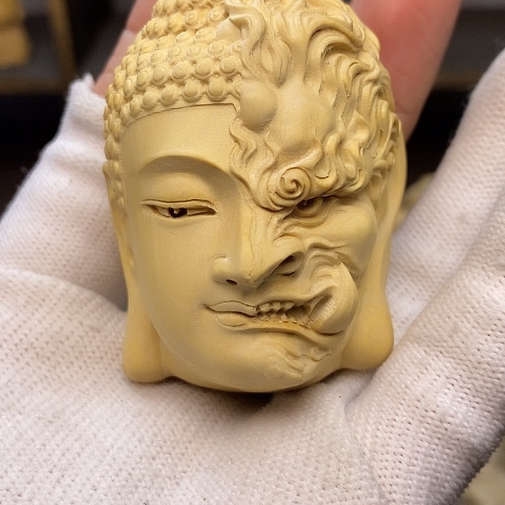 木黄杨木一念之间手把件