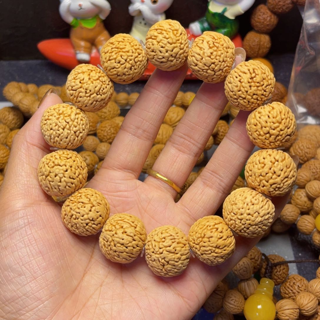 桃核吊坠20.8龙鳞凤尾手串