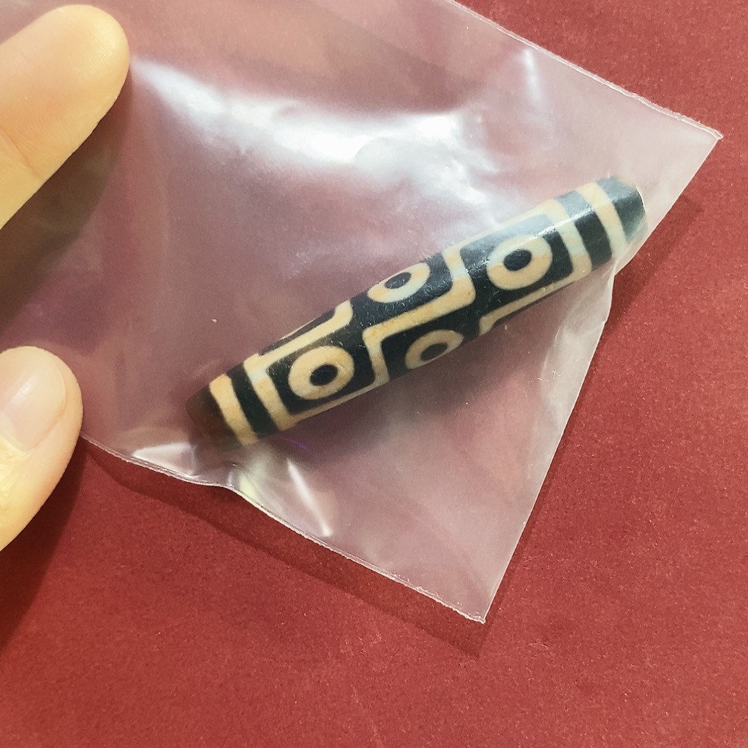 肖****玛瑙/玉髓未镶嵌颈饰行运九眼