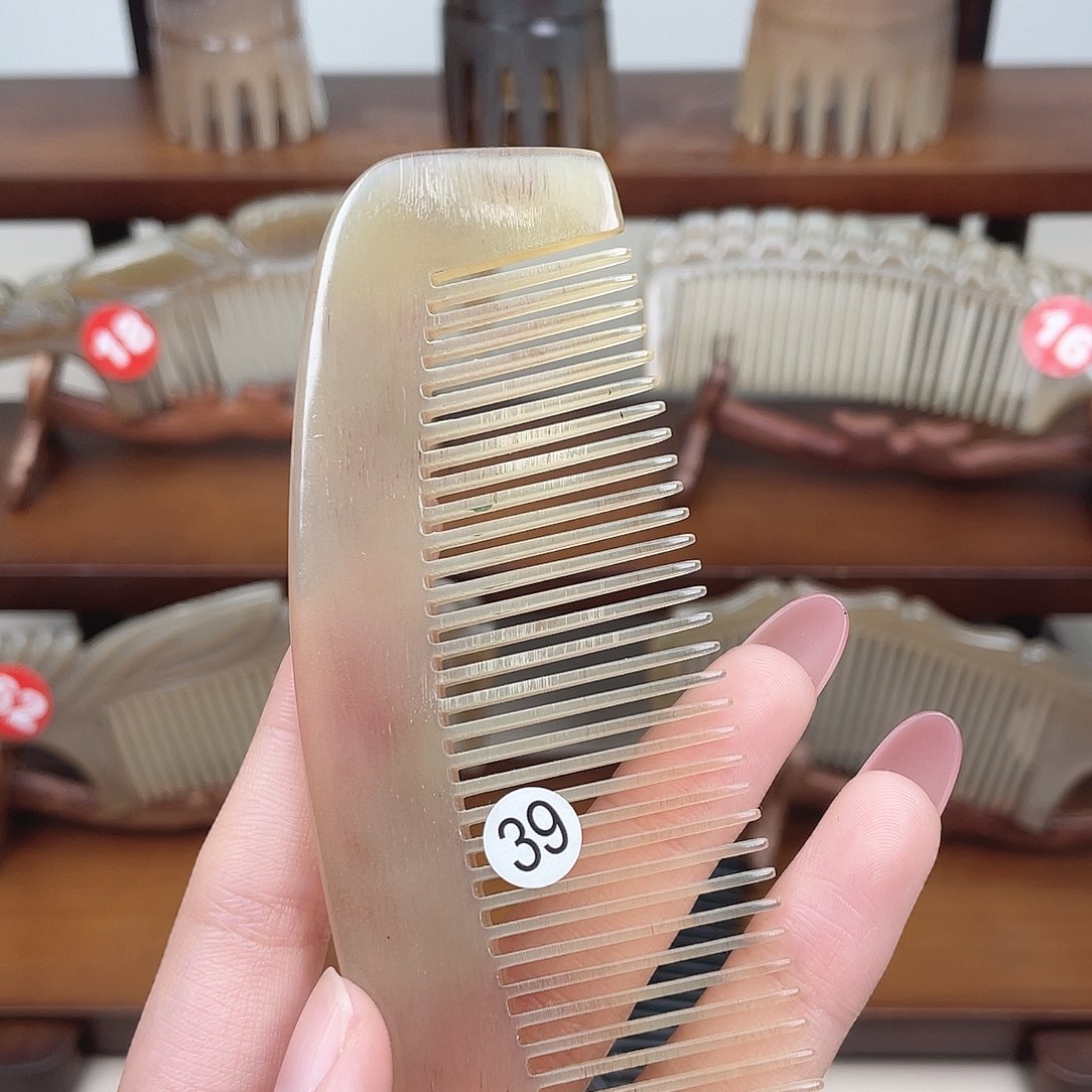 纯手工制作的牛角梳39蝈*
