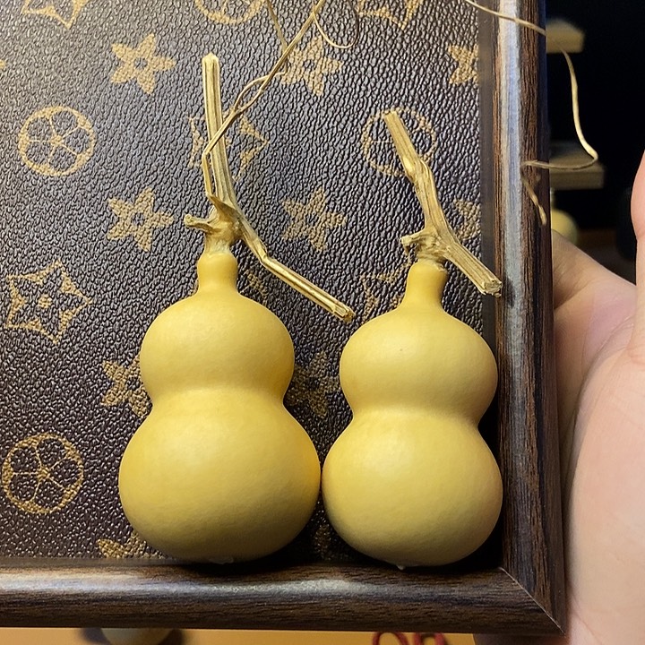 一***端一物一拍2个，手把葫芦