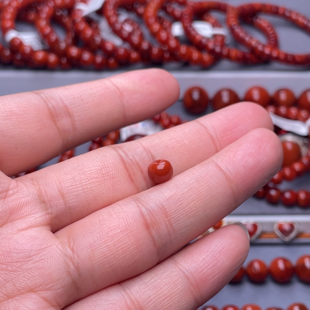 兜***࿐南红玛瑙未镶嵌配珠7mm瓦西柿子红老型单珠