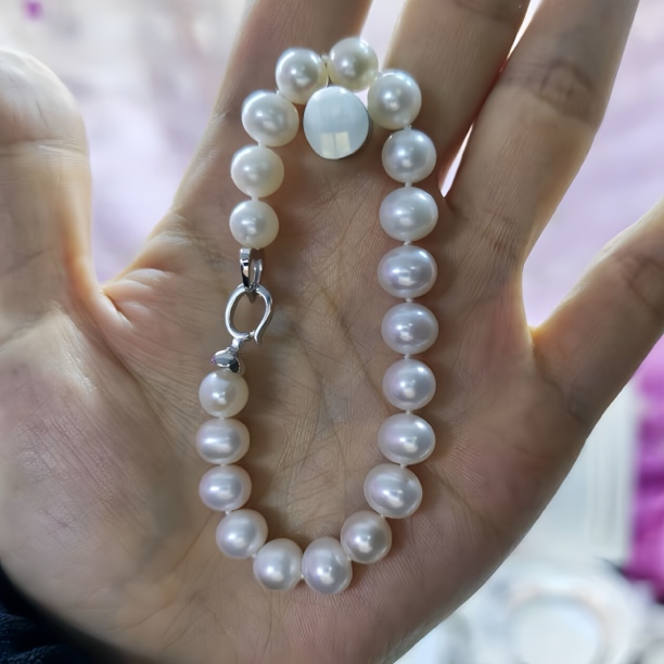 淡水珍珠手链自然白透粉椭圆近圆微微瑕强光S925银爱心扣手串