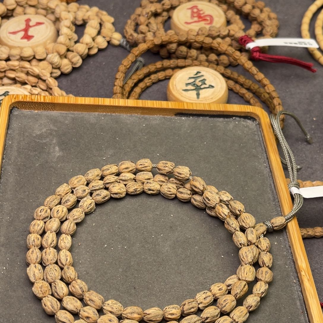 柏香籽/百香籽手串招**?