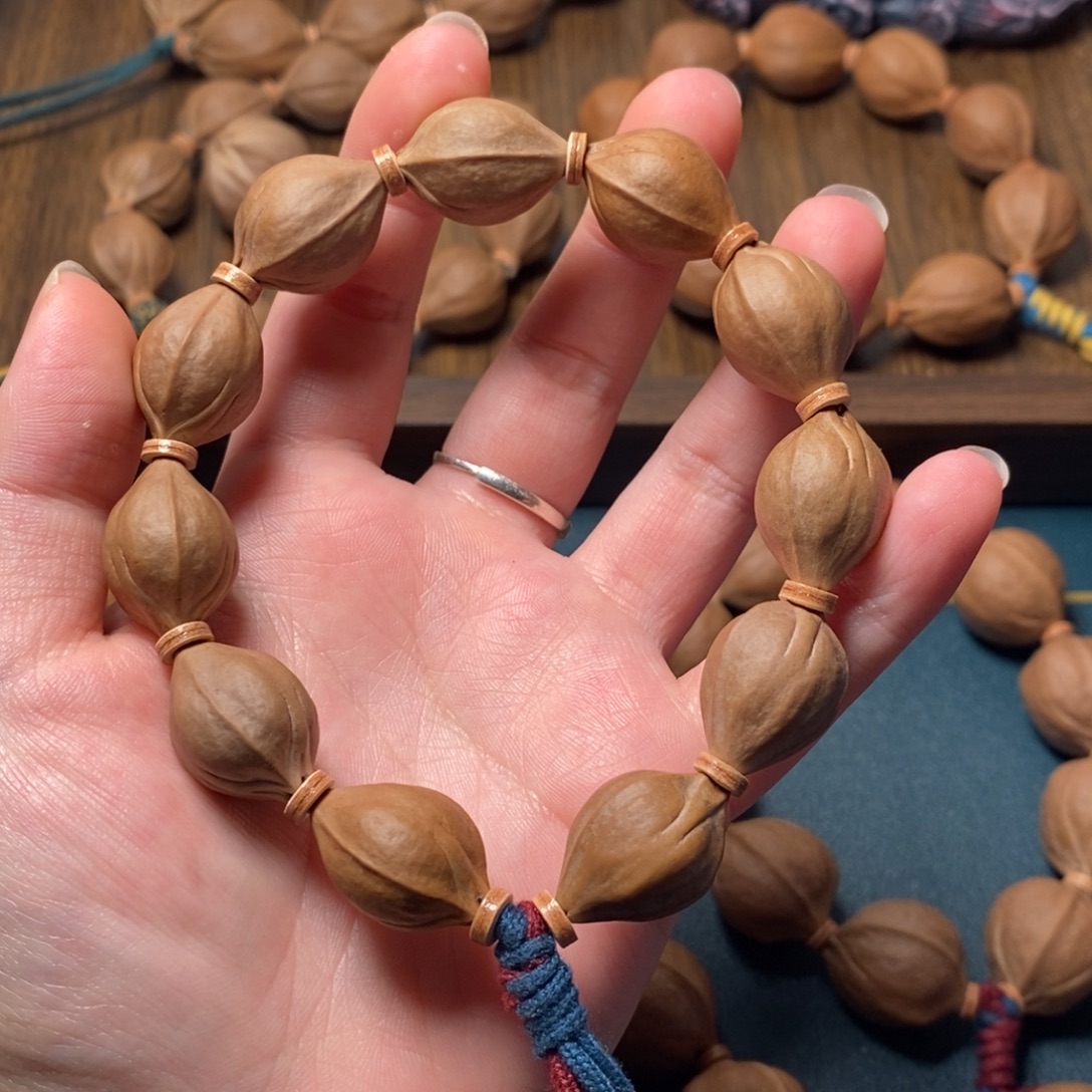 ****L橄榄核手串/手链1521梅林铁三花橄榄核三面佛