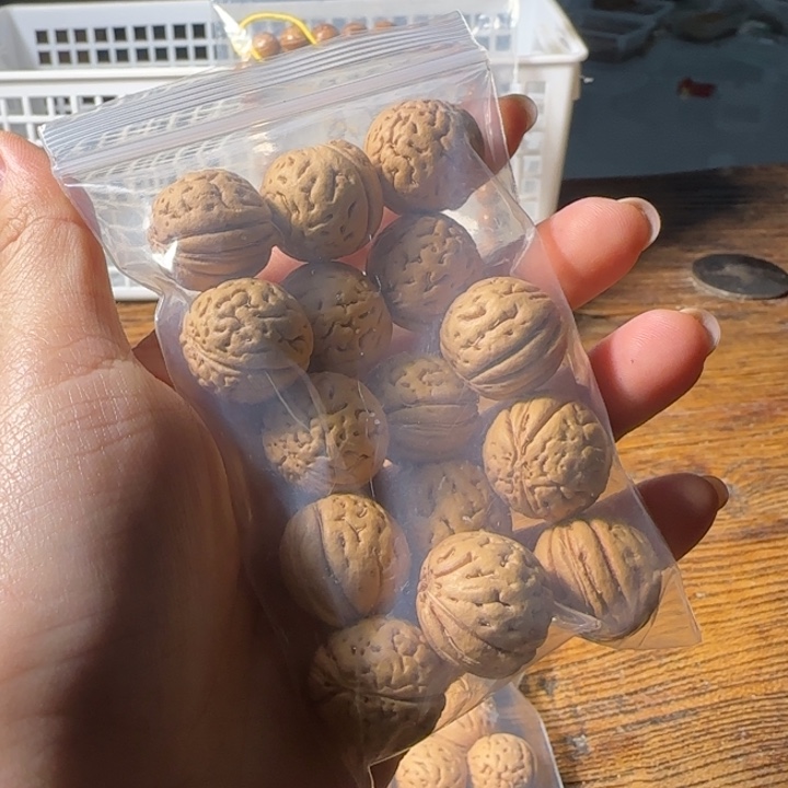 ヅ****桃核吊坠盘锦大肌肉