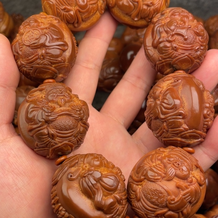 赵***货橄榄核吊坠橄榄核
