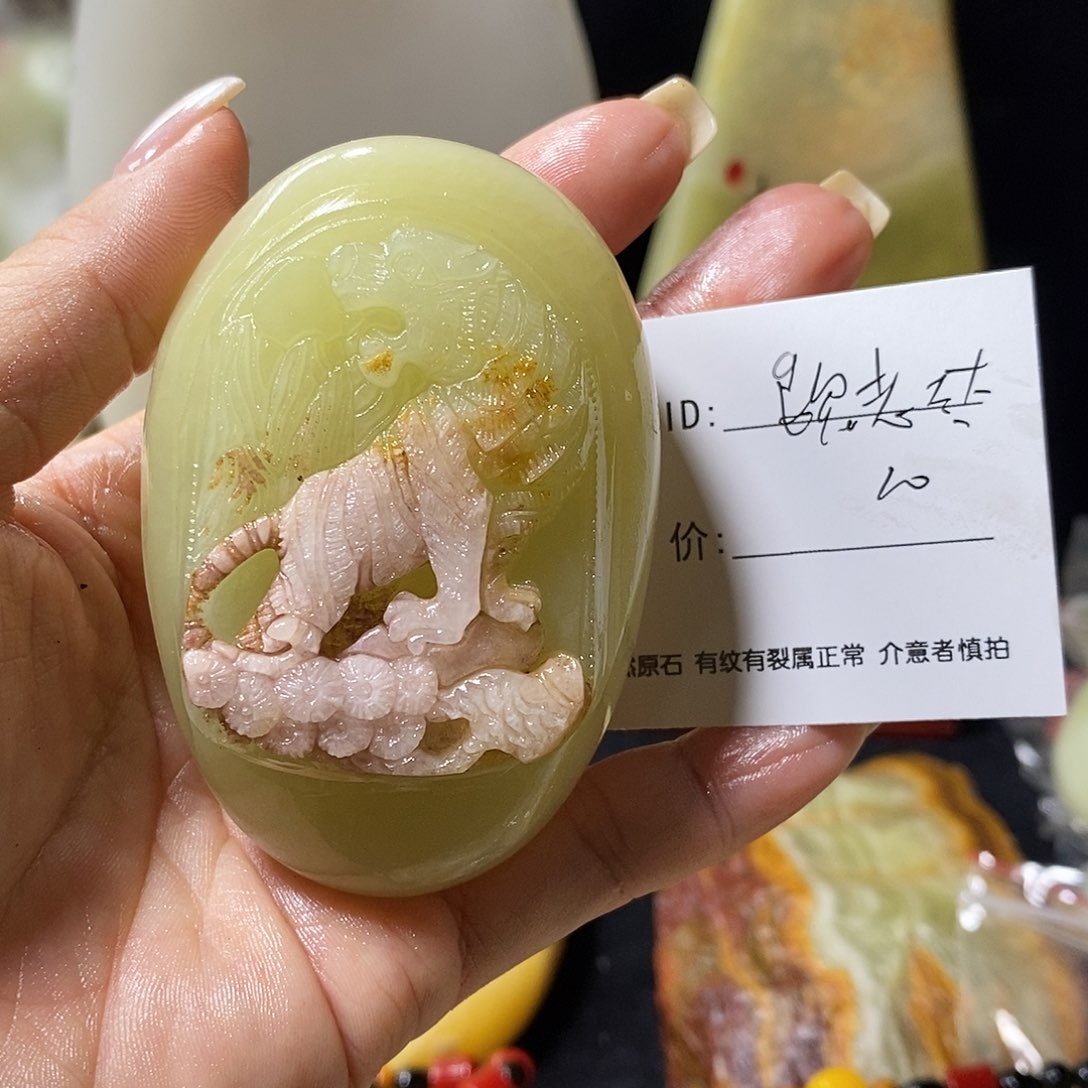 石材魏**太古青石手把件