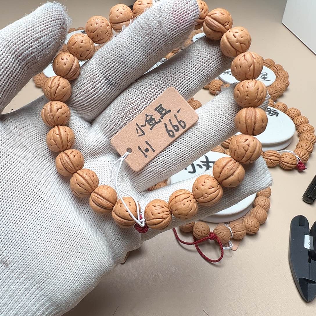 桔***爱手串桃核1.1小金豆精品