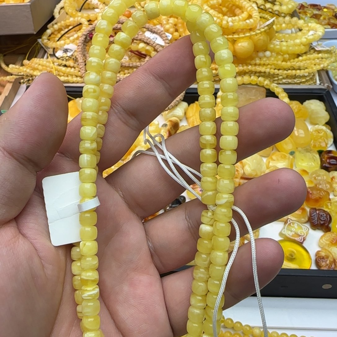 卤***飯琥珀未镶嵌裸石四分之一链