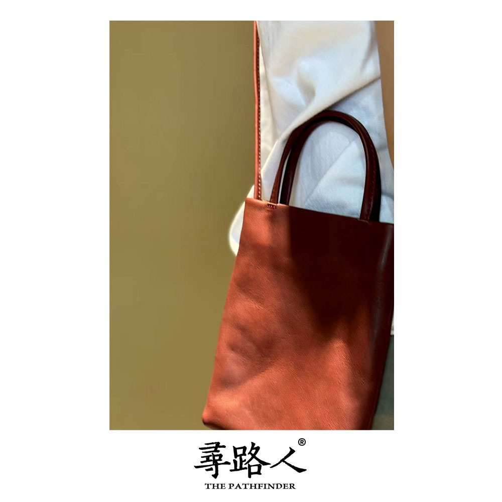 寻路人藏系列质感真皮复古小众简约手提斜挎手机包