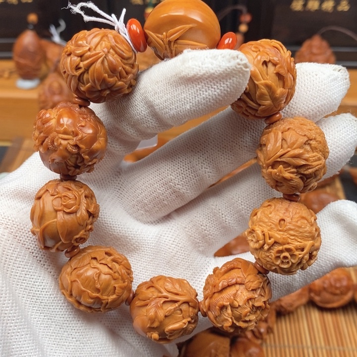 橄榄核手串木****宝许忠英老师花开富贵