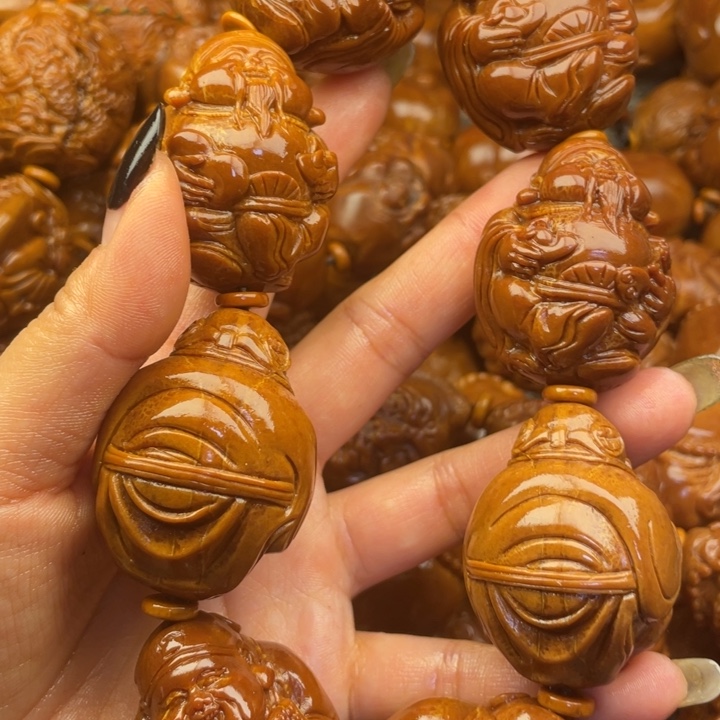 橄榄核吊坠开***乐橄榄核