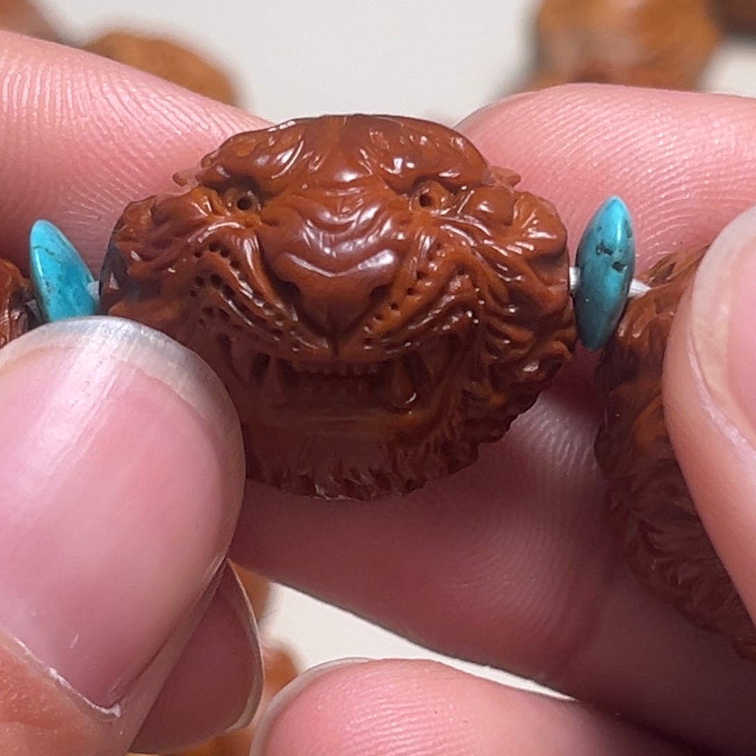 橄榄核吊坠木*哥虎头回血