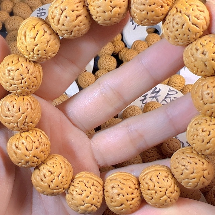 小***爱桃核吊坠盘锦奶豆桃核