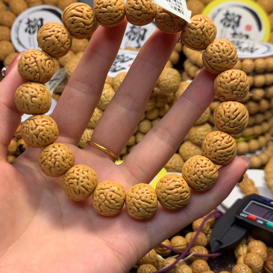 哲***子精品桃核野生大肠手串