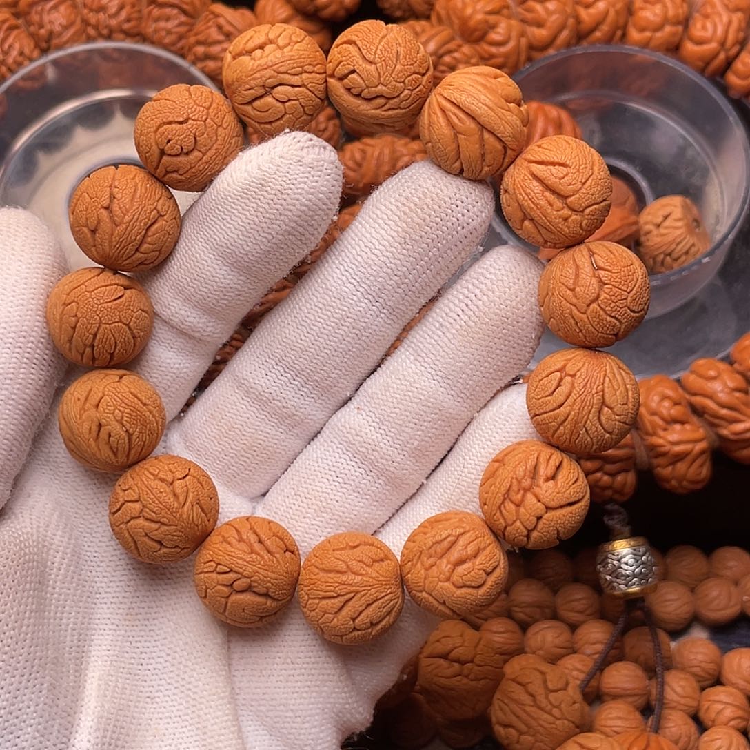 手串桃核金丝龙珠1.6