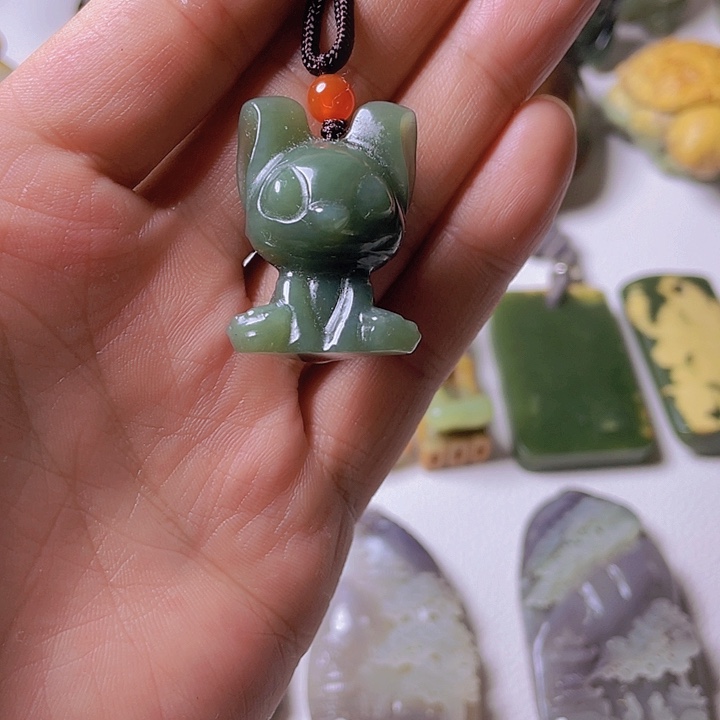 和田玉手把件未镶嵌