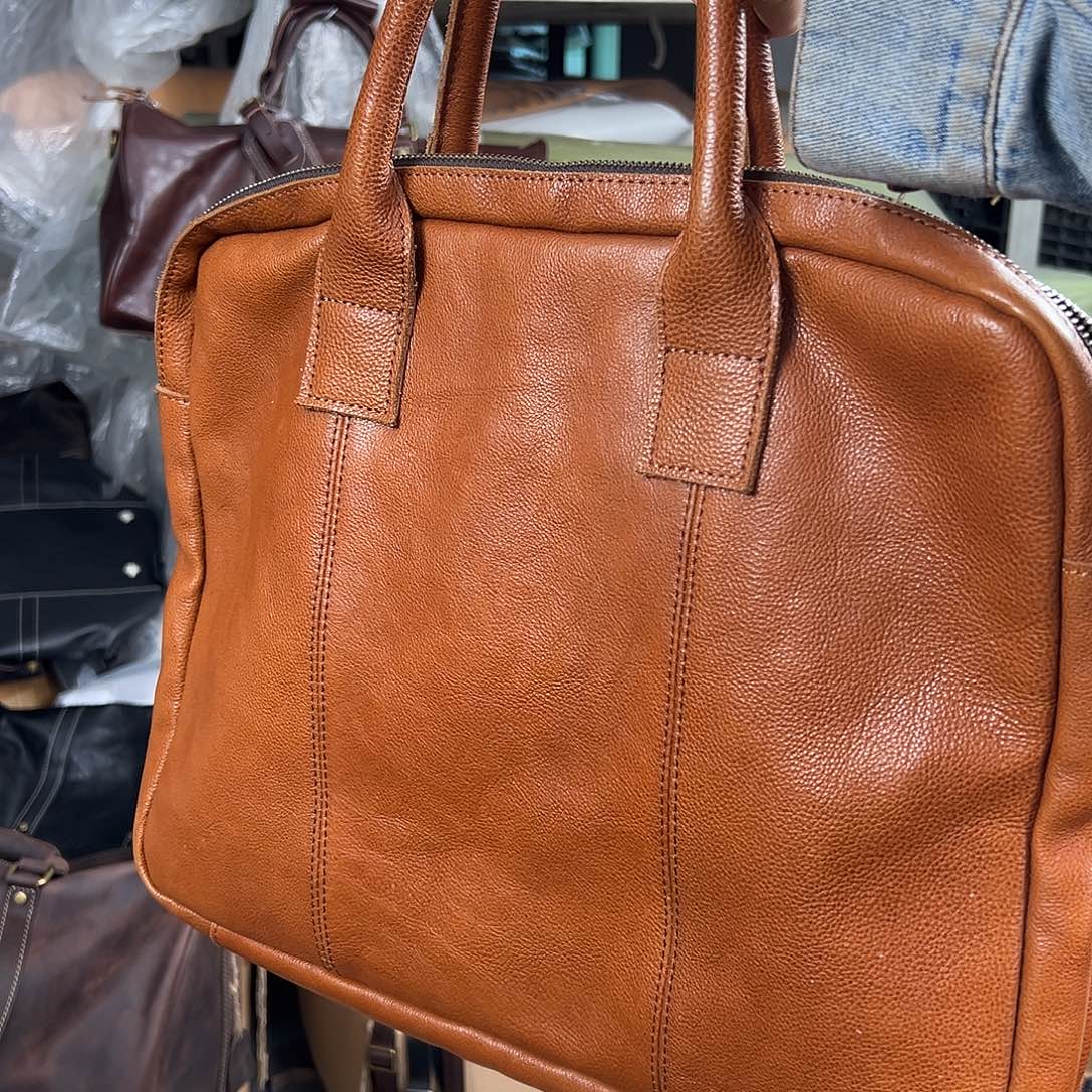 日落黄头层牛皮手提包