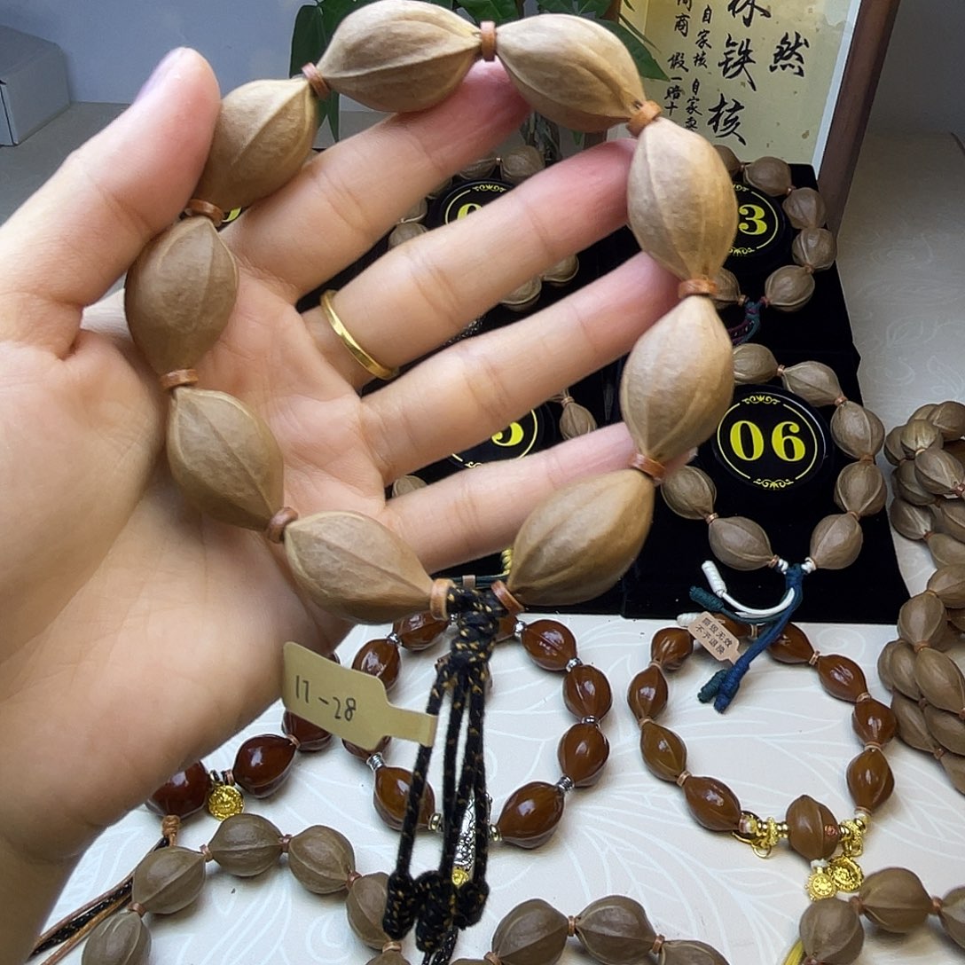 A***E手串橄榄核梅林铁核17*28