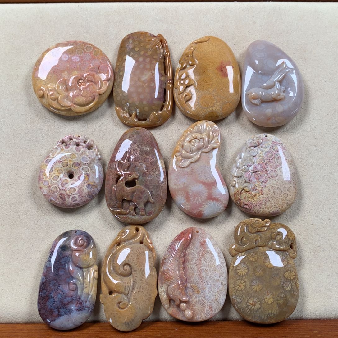 硅化珊瑚（珊瑚玉）雕刻件大漏100/个，可挑。未镶嵌