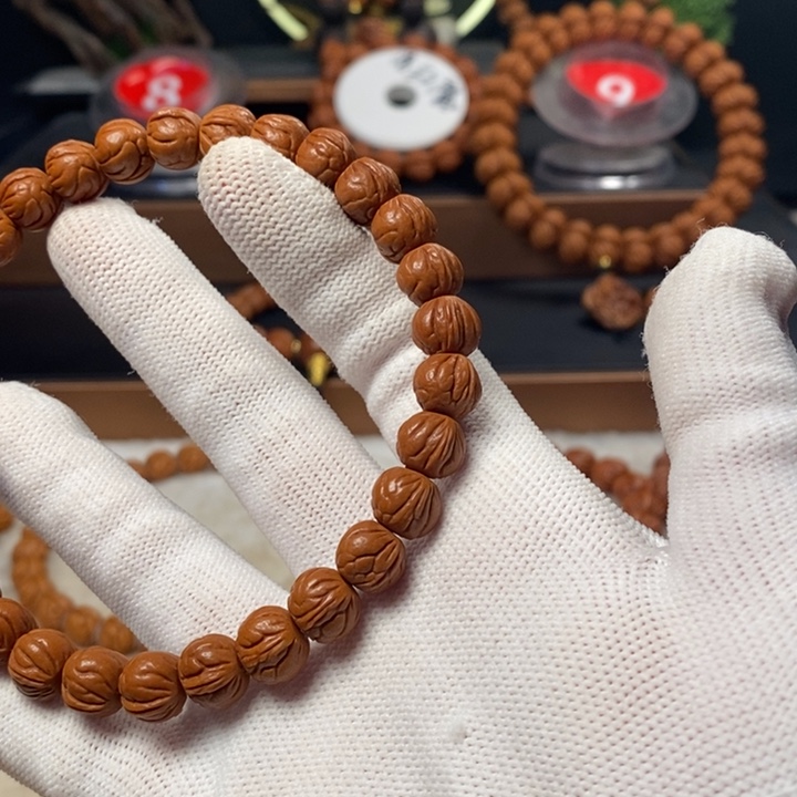 桃核吊坠周****活秦岭龙纹