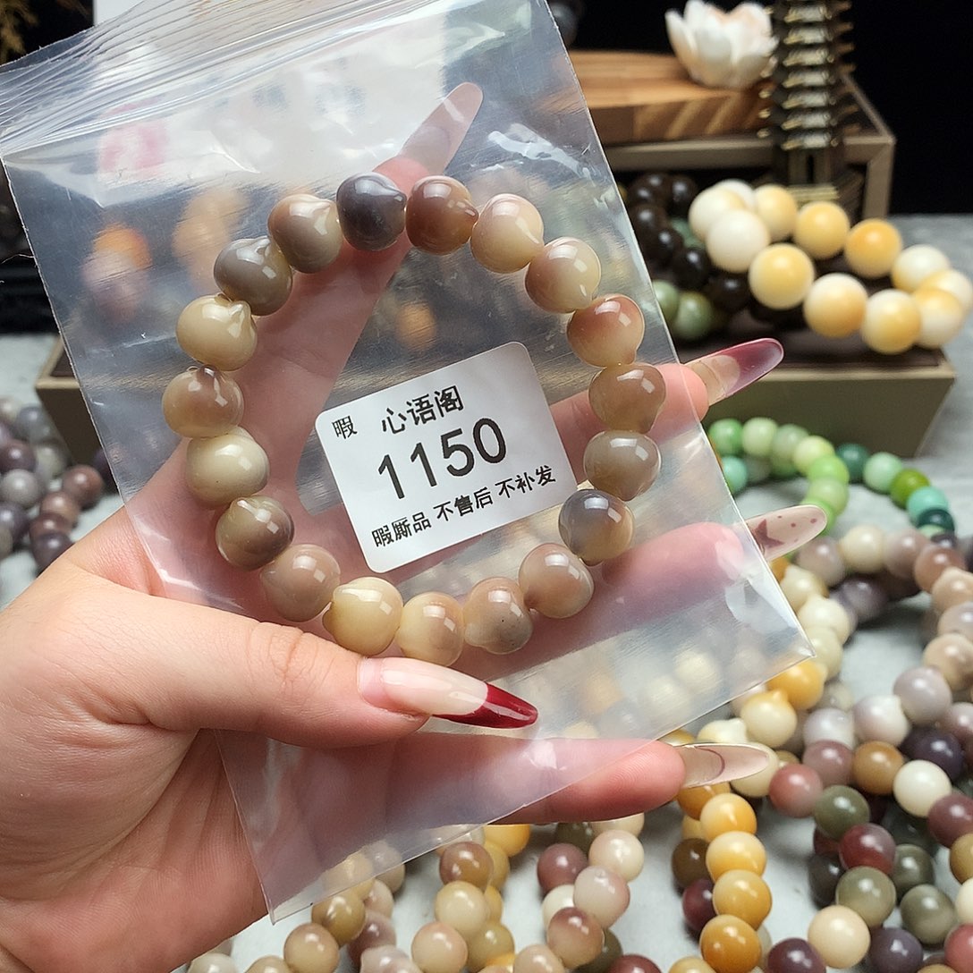 骑***灯菩提根/象牙果手串瑕疵1150不售后
