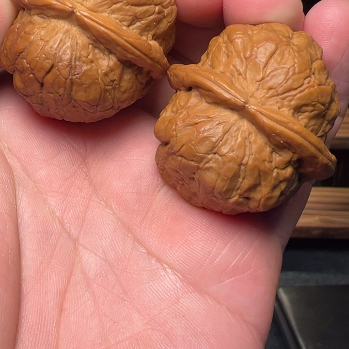 文玩核桃把件七彩螺40mm