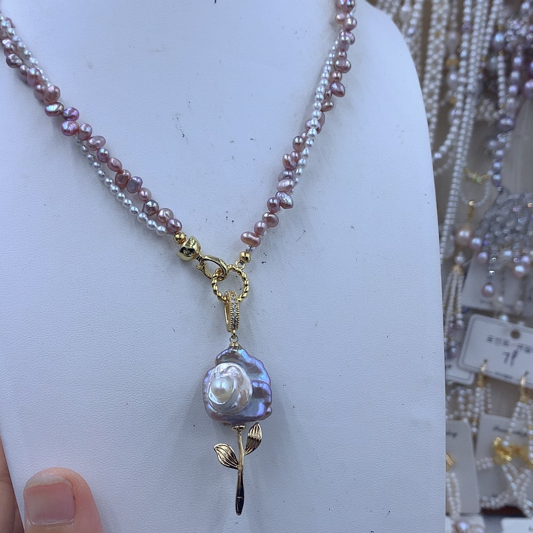 洋***生淡水珍珠银S925镶嵌项链耳饰