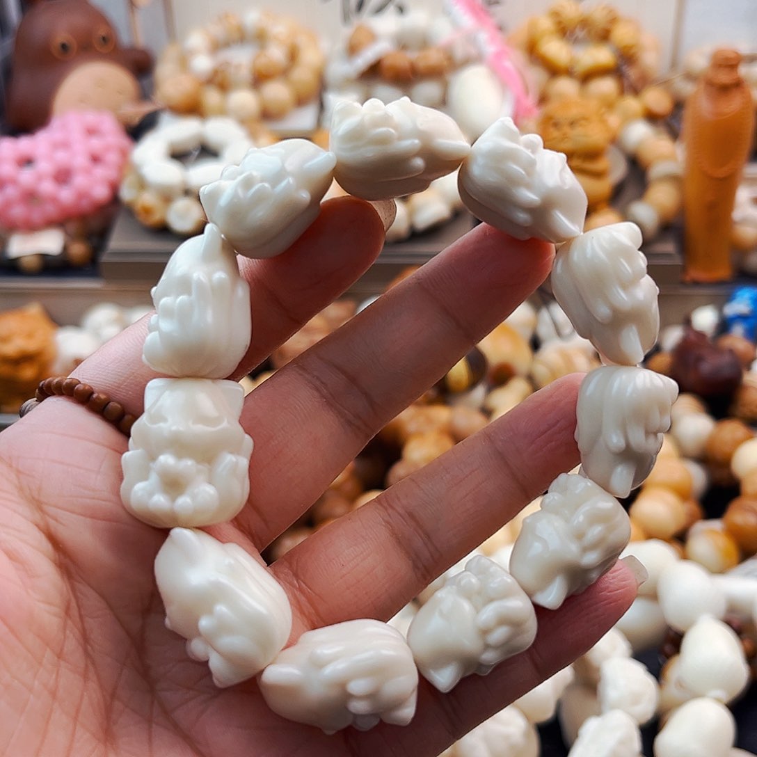 菩提根/象牙果吊坠凤九孤品九折